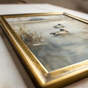 Impressionistic wall art featuring floating ducks for bedroom — moody tones and tranquil marsh scenery create a cozy farmhouse vibe.