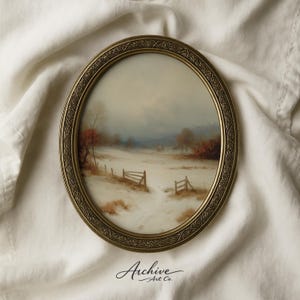 May include: An oval framed print in an antique style, depicting a winter landscape with snow-covered fields, trees, and a fence. The frame has an ornate, gold-coloured design. The print is labelled "Archive Art Co."