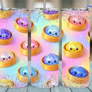 May include: A tumbler with a repeating pattern of smiling dumplings in golden steamer baskets against a pastel rainbow background. The dumplings are purple, pink, blue, and yellow, with glitter accents. The tumbler is approximately 20 cm tall.