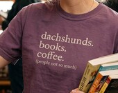 → View on Etsy: Dachshunds Books Coffee Shirt, Introvert Tee, Doxie Sausage Dog Mom Gift, Bookworm Shirt, Wiener Dog tshirt, Comfort Colors 1717 Dachshunds Books Coffee Shirt, Introvert Tee, Doxie Sausage Dog Mom Gift, Bookworm Shirt, Wiener Dog tshirt, Comfort Colors 1717