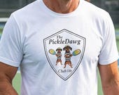 → View on Etsy: PickleDawg Club T-Shirt, Dachshund Pickleball Shirt, Funny Wiener Dog Tee, Doxie Mom Gift, Dog Lover Shirt PickleDawg Club T-Shirt, Dachshund Pickleball Shirt, Funny Wiener Dog Tee, Doxie Mom Gift, Dog Lover Shirt