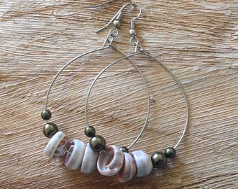 Puka shell hoop earrings.