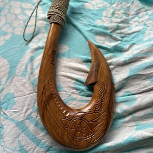 carved fish hook from moana Koa Wood Necklace for Sea Lovers Perfect for ages 3 and up. The Significance of Maui Hook