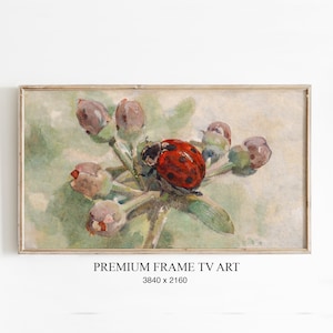 Pode incluir: Pintura em aquarela emoldurada de uma joaninha em uma planta com botões. A joaninha é vermelha com manchas pretas. A pintura tem uma paleta de cores suaves com o texto "PREMIUM FRAME TV ART" e a resolução.