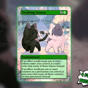 May include: A Doubling Season trading card featuring an illustration of a black cat and a white cat with gray patches standing on a path. Their tails form a heart shape. The card text describes an enchantment effect for game play mechanics.