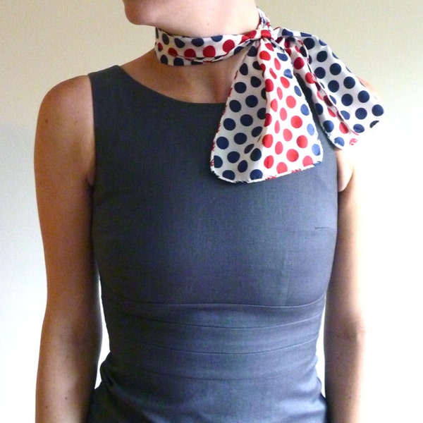 Jet set scarf. Red, white & navy blue neck tie with circles.