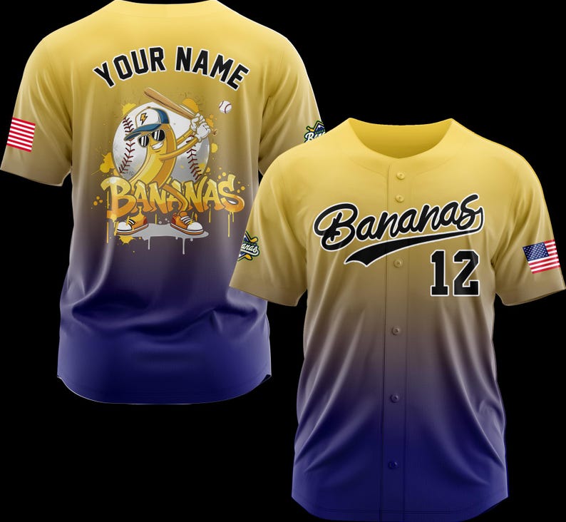 May include: Yellow and blue baseball jersey with the word "Bananas" in black script and the number 12. The jersey has an American flag patch on the sleeve. The back of the jersey features a cartoon banana playing baseball with the words "Your Name".
