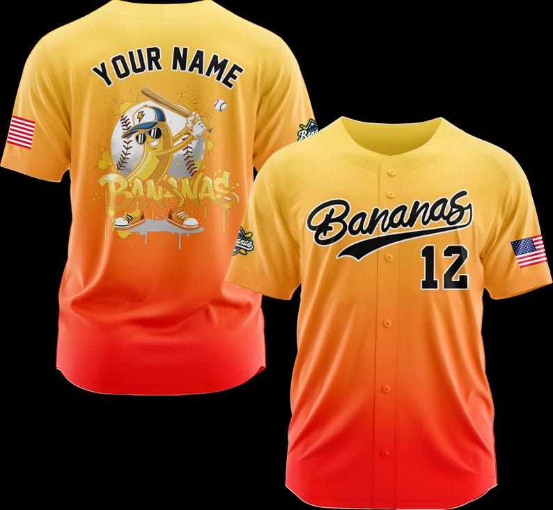 May include: Yellow, orange, and red baseball jersey with the word "Bananas" in black script and the number 12. The back of the jersey features a cartoon banana playing baseball with the words "Your Name" above it.