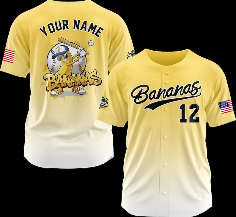 May include: Two yellow baseball jerseys. One features a cartoon banana character with a baseball bat and the text "Bananas". The other jersey has the word "Bananas" and the number "12" in black.