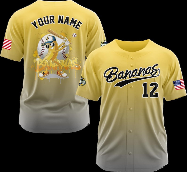 May include: Two yellow baseball jerseys. One features a cartoon banana playing baseball with the text "Bananas" and "Your Name". The other jersey has "Bananas" and the number "12" on the front, with an American flag patch.