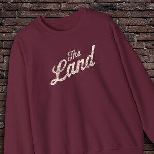 Puede incluir: Un juego de tres tazas de cerámica con un acabado mate moteado. Las tazas son de color crema, gris claro y gris oscuro. Cada taza tiene un diseño simple y minimalista, ideal para café o té.