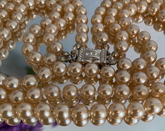 JBK bib style Pearl necklace. Faux Pearls, Silver Plated box clasp with faux Diamonds 16" with three strands.