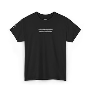 May include: Black t-shirt with the text "Kerosene Dopamine Chemical Induced" in white, centered on the chest. The shirt has short sleeves and a crew neck. The image is taken on a white background.