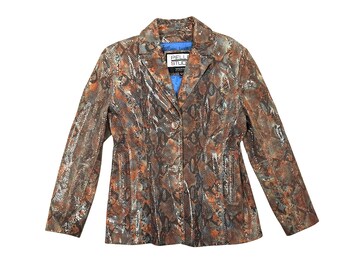 May include: A brown, orange, and gray snakeskin-patterned jacket with a notched collar and three buttons. The jacket has long sleeves and a blue lining visible at the collar. The label reads "Pelle Studio".