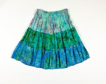 1990s / y2k / Tie Dye Tropical Floral Mini Skirt / Tiered Ruffles / Green and Purple / Wax Resist / Small / Medium / Pleated / Rayon / Beach