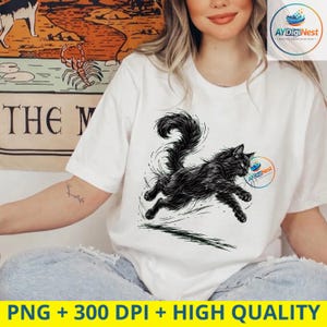 May include: A white short-sleeved t-shirt featuring a detailed black ink-style illustration of a fluffy cat in mid-leap. The cat has long fur, a bushy tail, and is depicted with dynamic motion lines. A small circular logo is visible near the cat.