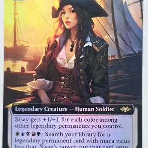 May include: A Magic: The Gathering card featuring "Sisay, Weatherlight Captain." The card shows a woman in a pirate-style outfit, with a black hat and jacket. The background shows a sunset over the sea. The card text is visible.