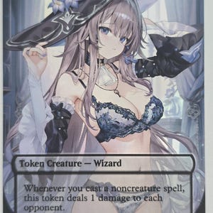 May include: A collectible card featuring a female wizard illustration. The card has the word "WIZARD" at the top and text at the bottom that reads "Token Creature - Wizard". The card has a 0/1 power/toughness rating.