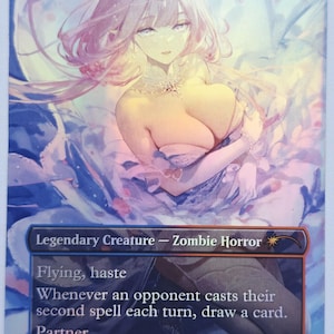 May include: A holographic trading card featuring a female character with long pink hair and a floral headpiece. The card reads "Kraum, Lyrnus" and "Legendary Creature - Zombie Horror." It includes game text and a 4/4 power/toughness.