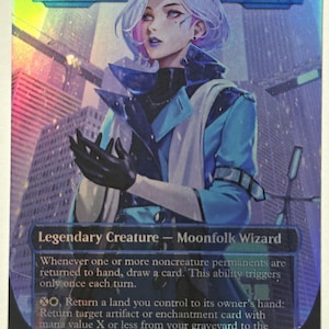 May include: A holographic trading card featuring a character with lavender hair and blue clothing. The card reads "Tameshi, Reality Architect" and "Legendary Creature - Moonfolk Wizard". The background shows a futuristic cityscape.