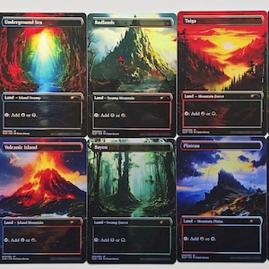 May include: A collection of ten rectangular trading cards featuring vibrant, full-art landscape illustrations. Each card displays a unique terrain, including tundra, volcanic island, and tropical island, with text labels and game symbols at the bottom.