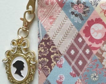Limited edition Jane Austen 250th Anniversary project bag with silhouette charm. Optional thread bed. Script lining. Cross stitch WIPs.