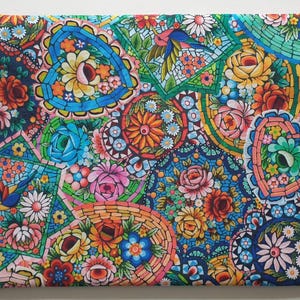 May include: A colorful, floral-patterned pouch with a drawstring closure. The design features a mosaic-like arrangement of flowers, hearts, and birds in shades of blue, pink, orange, and green. The pouch is rectangular and appears to be made of fabric.