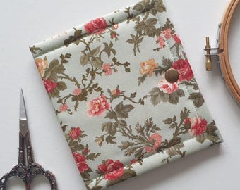 Moda 'Ambiance' thread/floss keeper. ORT saver, project pal for cross stitch, embroidery threads. 5.5"x 10" open. Floral, foliage.