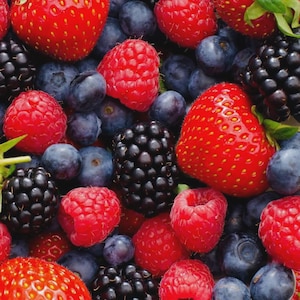 May include: A close-up shot of a mix of fresh berries. The image features bright red strawberries, raspberries, and blackberries, along with dark blue blueberries. The berries are arranged closely together, creating a colorful and textured display.