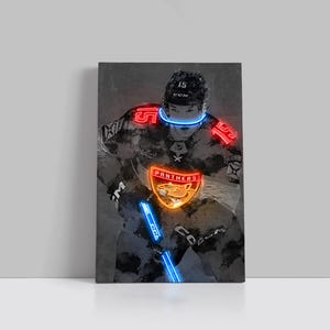 May include: A canvas print of a hockey player in a camouflage jersey with the number 15 in red neon. The player's helmet and hockey stick have blue neon accents. The team logo, "Panthers", is in orange neon.