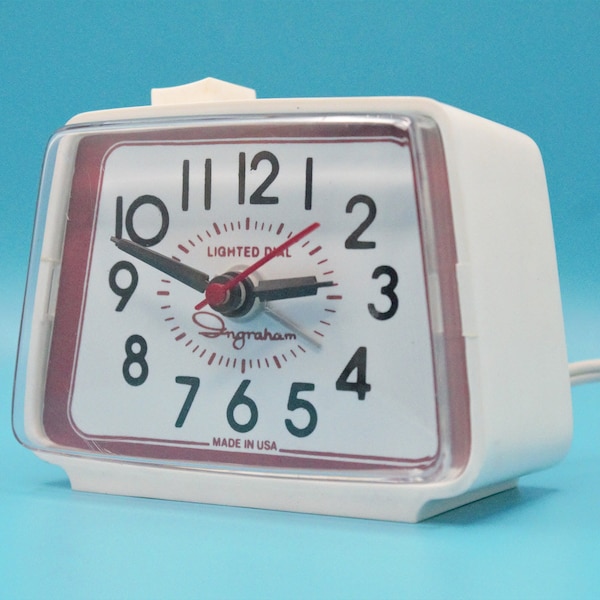 Vintage electric alarm clock analog backlit dial buzzer wake tone bedside nightstand second hand sweep white mod red Ingraham USA