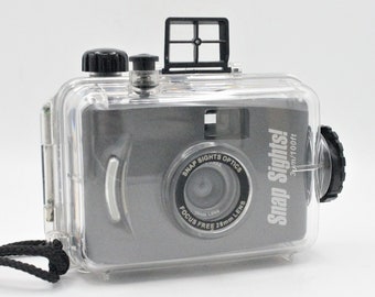 Vintage waterproof camera rubber sealed case 35 mm roll film photography Snap Sights 100ft harsh condition underwater dive camera
