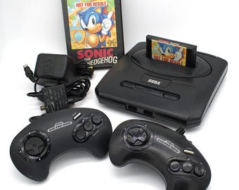 Vintage 1990s Sega Genesis video game console 16-bit system complete with Sonic the Hedgehog cart 2 controllers AV and power supply Japan