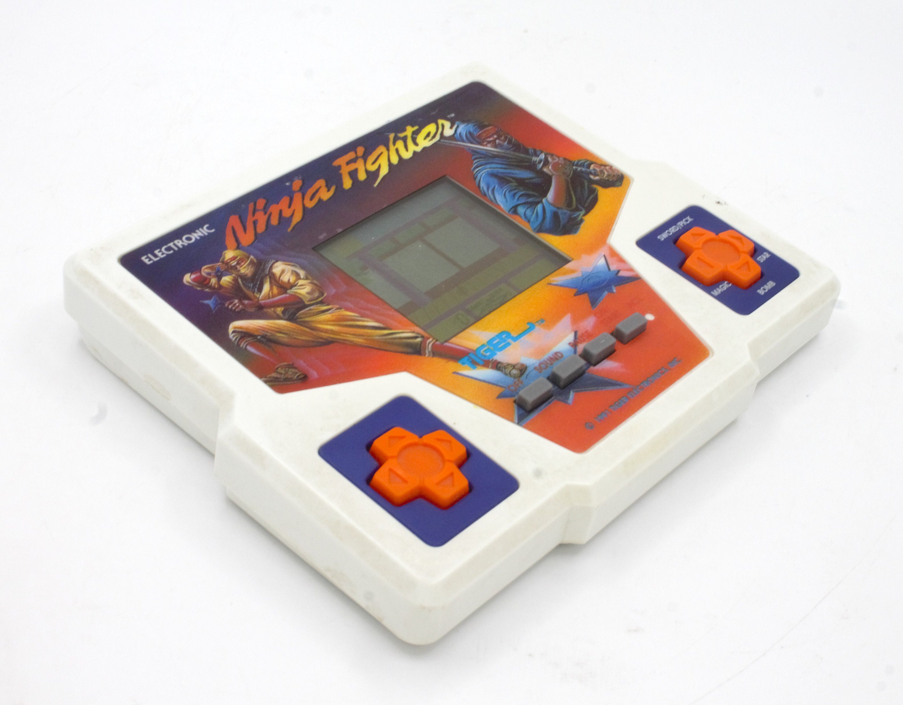 Vintage 1990s Ninja Fighter Electronic Handheld Game LCD Digital