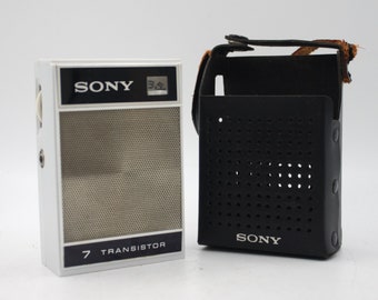 Vintage Sony transistor radio mini pocket AM solid state receiver in case white chrome Japan