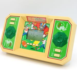 Vintage 1988 Talking Electronic Football game Head-to-Head Talking LCD digital handheld video game 1-2 player Tiger Electronics 1980s tech