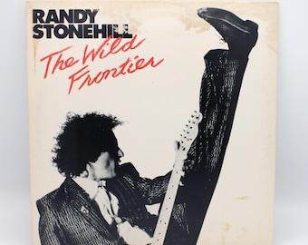 Vintage 1980's vinyl Randy Stonehill 1986 The Wild Frontier album 0riginal recording Rocketeers fan club flyer 12" stereo LP Word Records