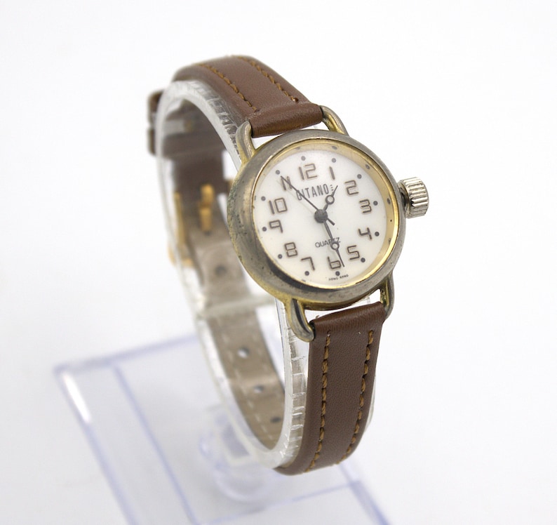 Vintage 90s Gitano wristwatch gold tone analog quartz dial brown leather band