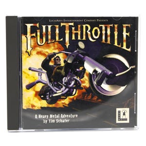 May include: A CD case for the video game "Full Throttle." The cover art features a biker on a motorcycle with the game's title in a fiery font. The text "A Heavy Metal Adventure by Tim Schafer" is also visible.
