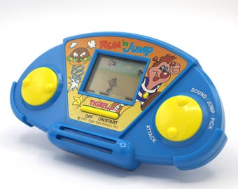 Vintage 1991 Handheld Run & Jump Video Game Tiger Electronics LCD