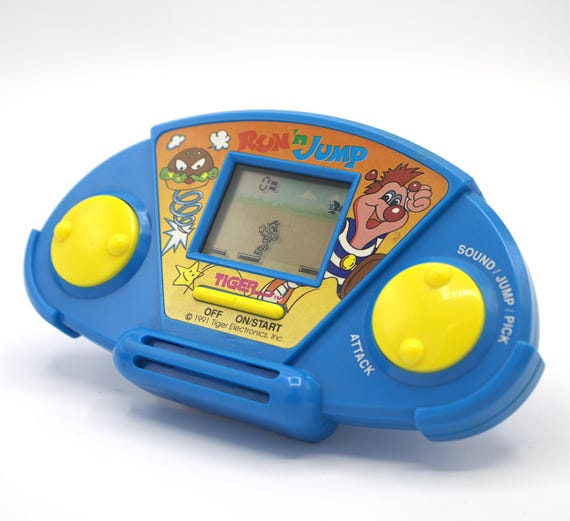 Vintage 1991 Handheld Run & Jump Video Game Tiger Electronics LCD