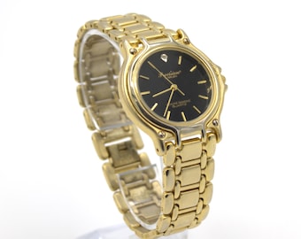 Vintage 1980s Gruen Precision Diamond Quartz gold tone wristwatch analog minimalist dial executive 80s fashion Japan movement