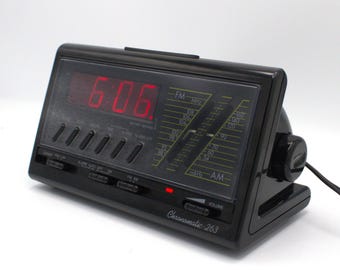 Vintage 1980s digital alarm clock radio AM/FM receiver red LED lighted dial cool mod design 80s style Chronomatic 263