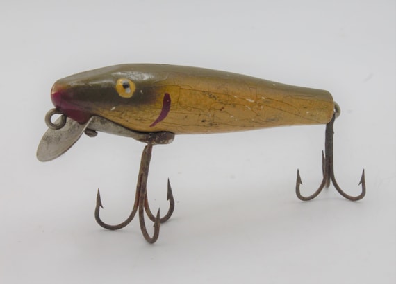 10 Vintage Fishing Lures That Still Catch Fish or Will Pad Your