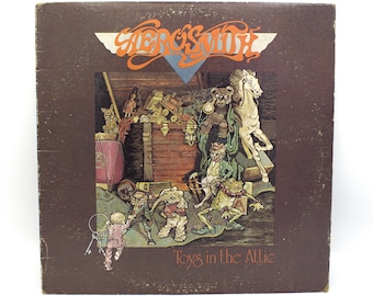 Vintage vinyl record Aerosmith 1975 album Toys in the Attic 70s classic rock original recording 12" stereo LP CBS Records