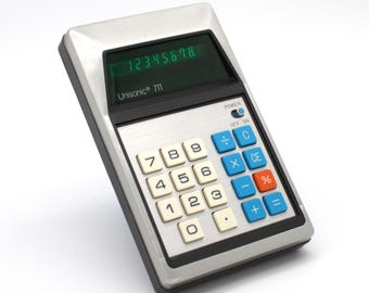 Vintage 1970s Unisonic digital electronic calculator green LED lighted numerical display mod hi-tech design silver aluminum