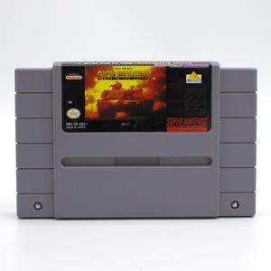 May include: A set of three ceramic mugs with a speckled, matte finish. The mugs are in shades of cream, light gray, and dark gray. Each mug has a simple, minimalist design and a rounded handle.