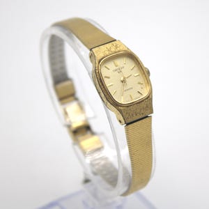 Vintage Orient VX Quartz Analog Dial Gold Tone Art Deco Style - Main Image