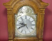 Vintage Westminster chime antique style electric clock hourly quarterly gong tone song beautiful woodwork detail brass ornate face analog
