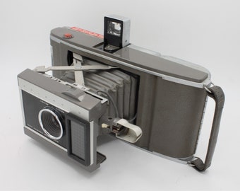 Vintage 1960s Polaroid Land Camera accordion folding light adjustment with flash instant film photography J 66 Polaroid USA